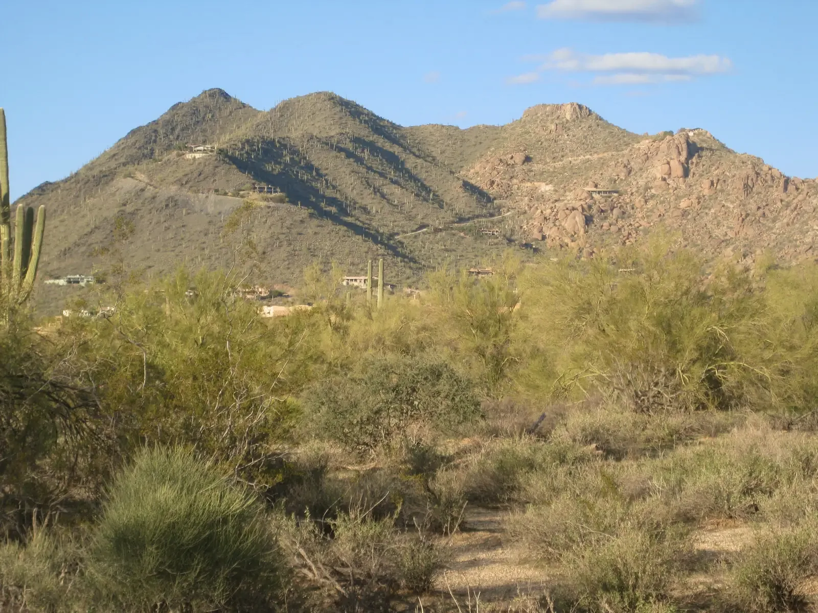 Black Mountain, the peak between Cave Creek and Carefree, under a blue sky